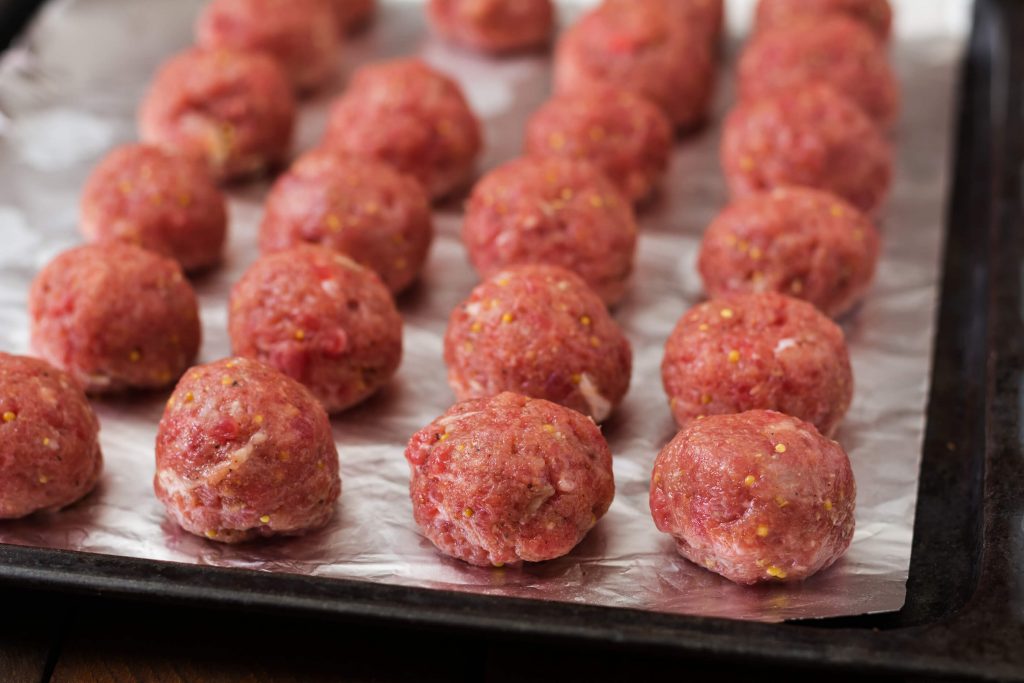 These Low Carb Mozzarella Stuffed Meatballs are a fun twist on a classic recipe - and modified to be a THM:S! Serve these as a party appetizer or a meal served over Miracle Noodles.