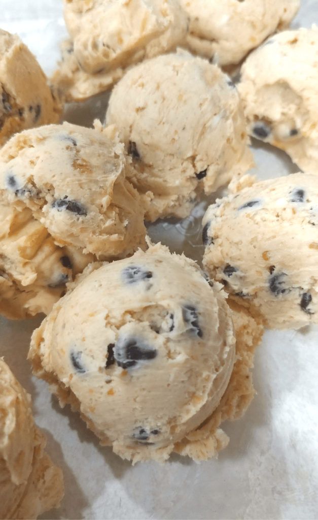 Looking for a quick and tasty recipe to help you get more fat in your diet? Make these no-cook Chocolate Chip Peanut Butter Cookie Dough Fat Bombs that are THM:S, Low Carb, Ketogenic, and Sugar Free!