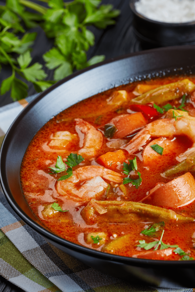 This Slow Cooker Keto Gumbo is not only fast and easy to make, it's delicious! Simply throw all the ingredients - minus the shrimp - in a slow cooker, then add the shrimp and cauliflower rice 20 minutes before serving.