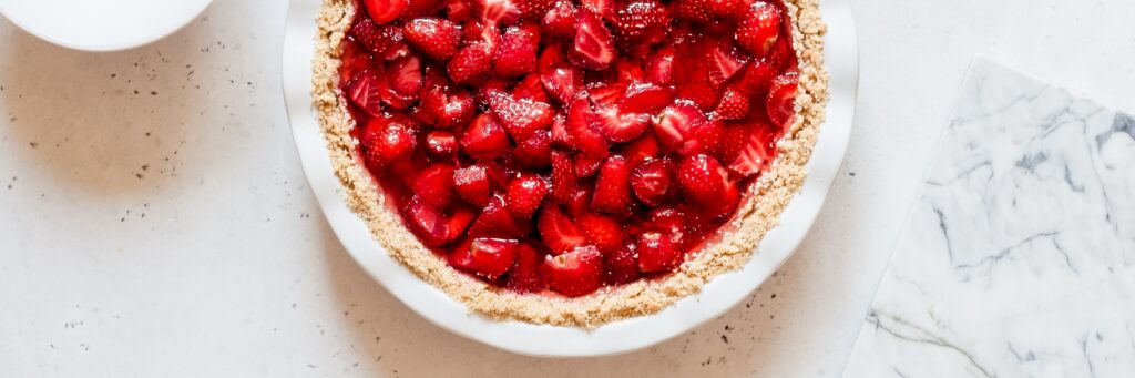 Enjoy this Keto Sugar Free Strawberry Pie anytime you're craving a sweet and fruity taste of summer! This fresh strawberry pie is a THM:S fuel, Ketogenic, Low Carb, and Grain free.