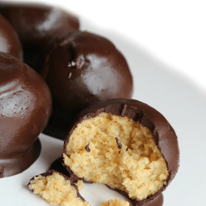 These Keto Truffles (with keto cake pop option) are delicious bites filled with cake and icing, and coated with a delicious chocolate so good you won't miss sugar!  They're so easy to make even the kids can help!