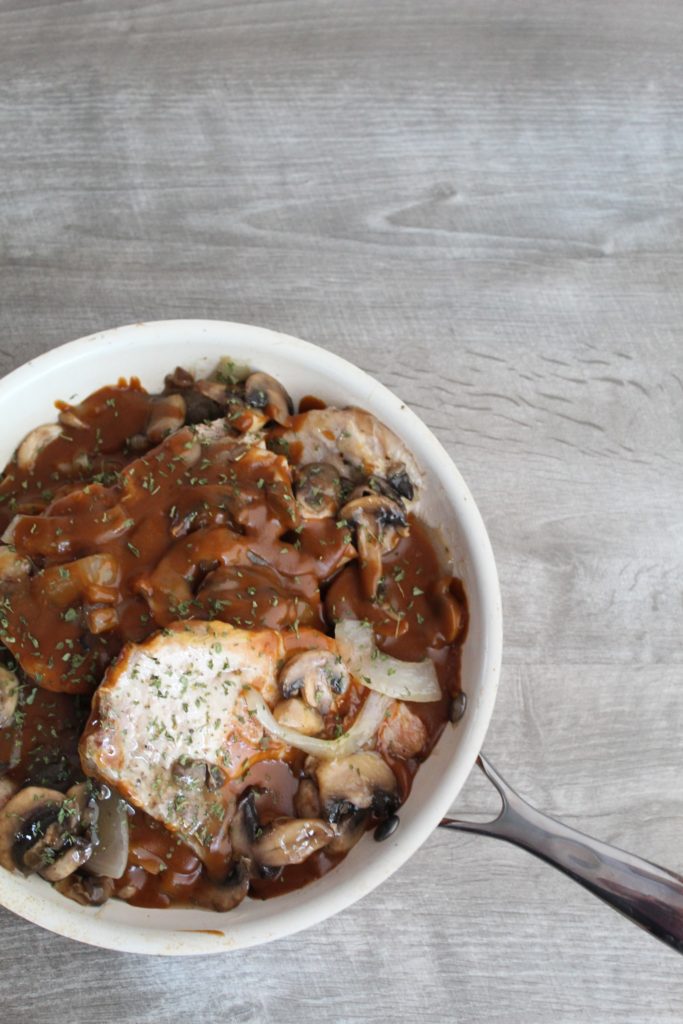 An easy on-pan meal the whole family will love, Skillet Pork Chops in Mushroom Gravy are low carb, ketogenic, a THM:S Fuel, and very cost effective if you're on a budget!