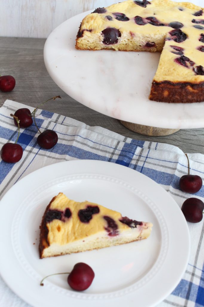 A tender sour cream cake with light flavor, topped with sweet & tart cherries, my Low Carb Sour Cream Cake is the perfect addition to breakfast, or as dessert after dinner.