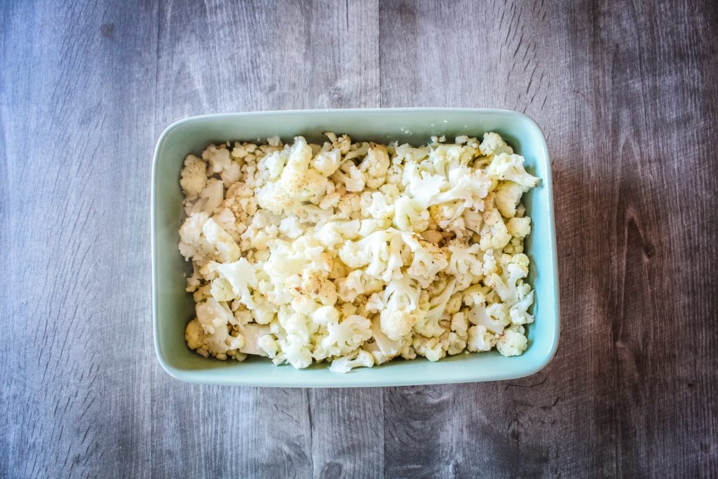 This Baked Cauliflower Mac & Cheese Casserole features some classic keto ingredients: heavy cream, a good dose of cheddar cheese, butter, and spices that'll make your mouth water.