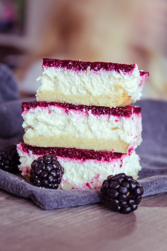 Delicious Keto Blackberry Cheesecake Bars (also known as Blackberry Bliss Bars) are easy, convenient and will fool even family and friends who aren't keto!