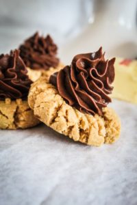 Your favorite Christmas treat, Peanut Butter Blossoms, make keto! Keto Peanut Butter Blossoms are a duplicate of the original recipe, but better for you and your family!