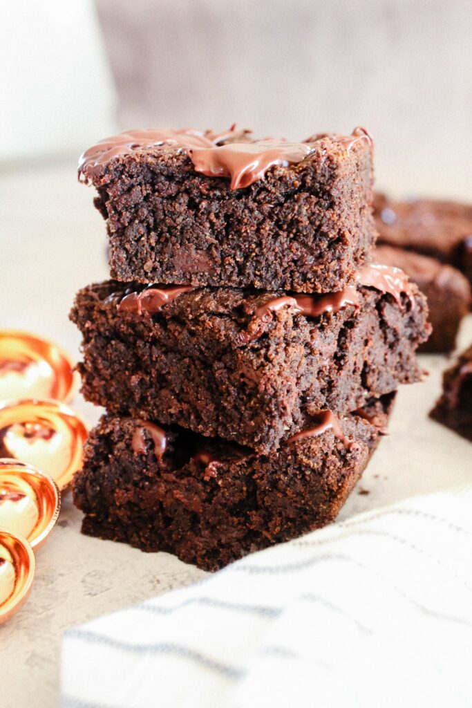 These are the most delicious Keto Brownies.  With a fudgey texture and fantastic macros, these brownies are easy enough to make that you’ll want to keep the recipe in your dessert rotation.