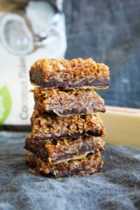 Between the buttery crust, the caramel coconut filling or the delightful chocolate, these Keto Samoa Bars will make you forget there ever was a sugary cookie with this same name!