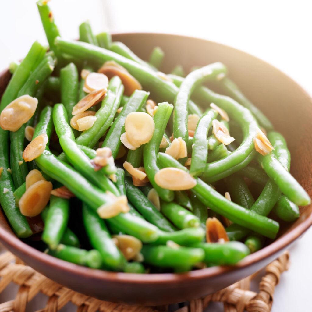 This simple side dish is a wonderful choice for your holiday family dinner.  Originally created for Easter Dinner, my Bacon Almond Green Beans are packed with healthy fats and nutrients from real, delicious ingredients.