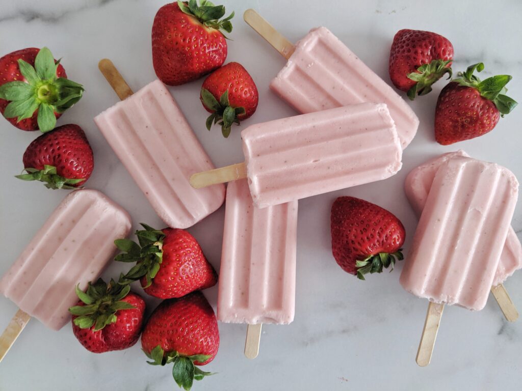 These Keto Popsicles are Strawberry Cheesecake and packed with protein from collagen and cottage cheese!  They're refreshing and sweet, yet healthy enough to eat guilt free!