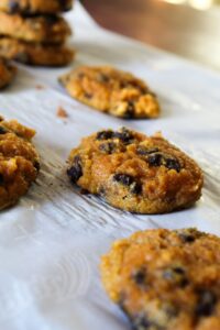 Easy-to-make gluten free and Keto Pumpkin Chocolate Chip Cookies are the perfect dessert for pumpkin spice season!  They're a great way to get that pumpkin flavor without all of the carbs.