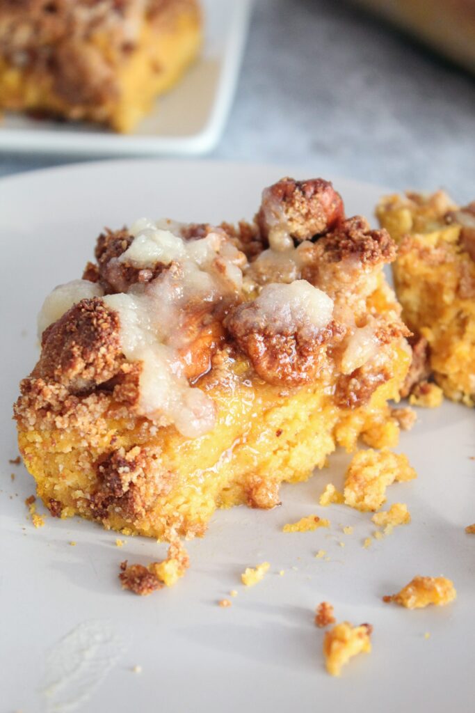 Keto Pumpkin Coffee Cake is the perfectly soft, seasonal treat with a deliciously sweet crumb topping and a keto honey butter. Make this cake for breakfast or for dessert!