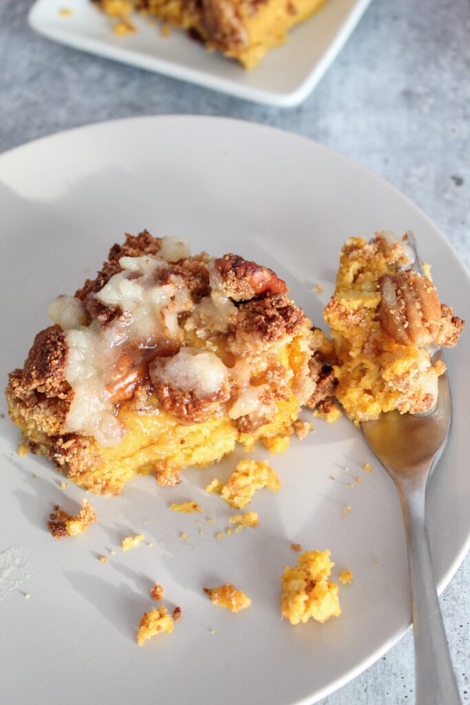 Keto Pumpkin Coffee Cake is the perfectly soft, seasonal treat with a deliciously sweet crumb topping and a keto honey butter. Make this cake for breakfast or for dessert!