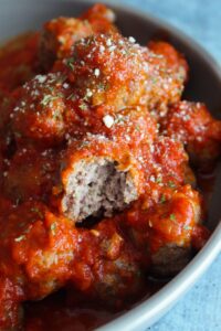 Keto meatballs are one of the simplest dinners you can make with ingredients already on hand!  You can dress them up as swedish meatballs, or keep it simple with sugar free marinara - either way you family will love them!