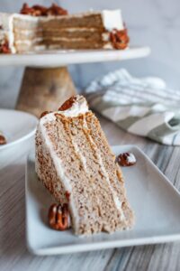 Keto Spice cake with a wonderful cream cheese frosting! One of my absolute favorite fall/winter cakes made keto, and stacked into a show-stopping layer cake.  