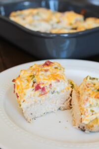 Keto Jalapeno Popper Chicken is a low carb casserole that makes everyone happy! Juicy chicken breasts, melty and spicy cheese topping make for a delicious dinner one day and lunch the next.