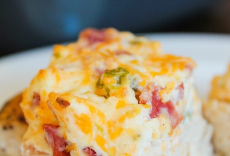 Keto Jalapeno Popper Chicken is a low carb casserole that makes everyone happy! Juicy chicken breasts, melty and spicy cheese topping make for a delicious dinner one day and lunch the next.