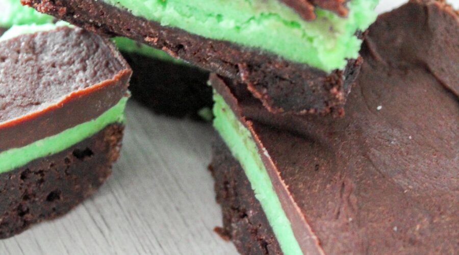Thick, fudgy keto brownies layered with fluffy mint frosting and a chocolate fudge topping.  These Keto Chocolate Mint Brownies will blow your mind whether you make them from a mix or from scratch.