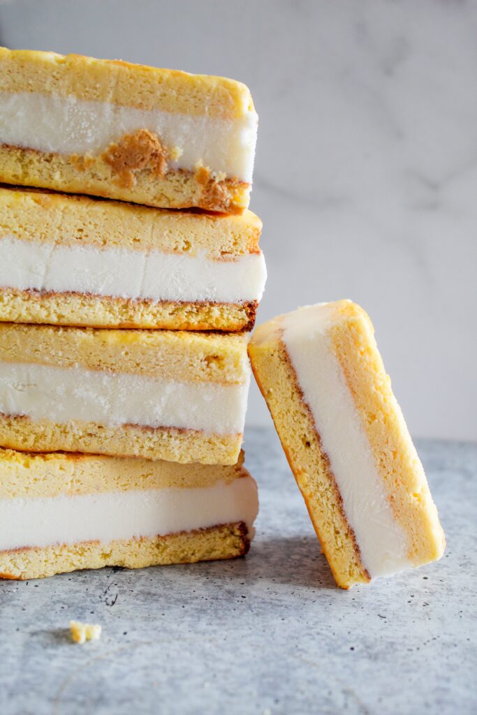 Let me show you how easy it is to make your own Keto Ice Cream Sandwiches inspired by a favorite childhood treat!  These are reminiscent of a frozen twinkie but made ketogenic, sugar free, low carb, and a THM:S