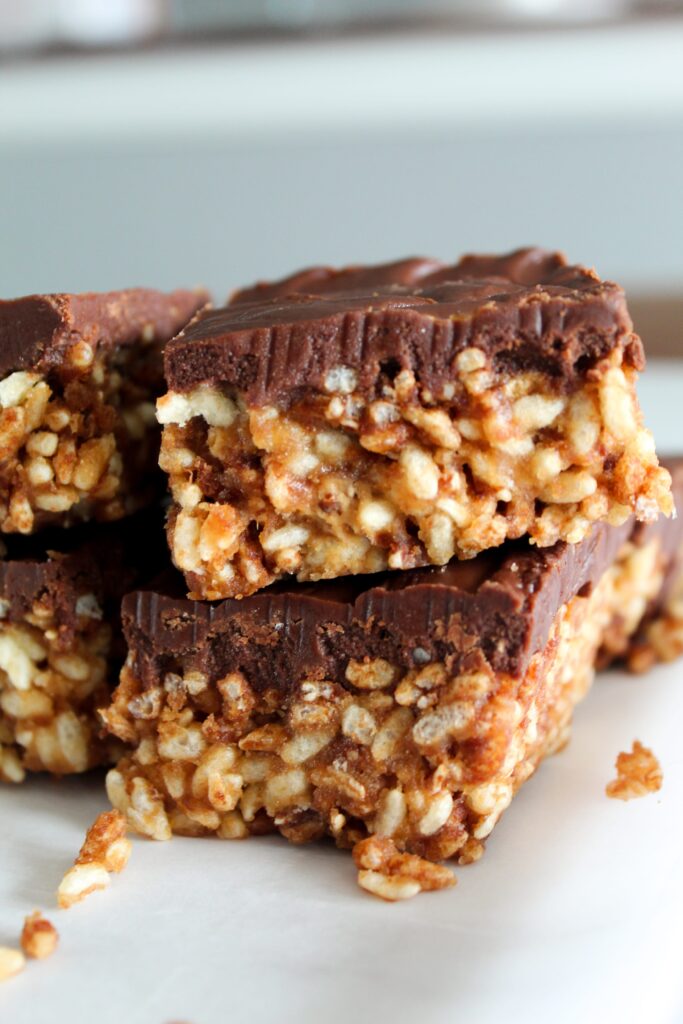 Keto Scotcheroos are a chewy no-bake peanut butter rice krispie bar with a butterscotch chocolate topping. My version is low carb, high protein, ketogenic, and a THM:S.