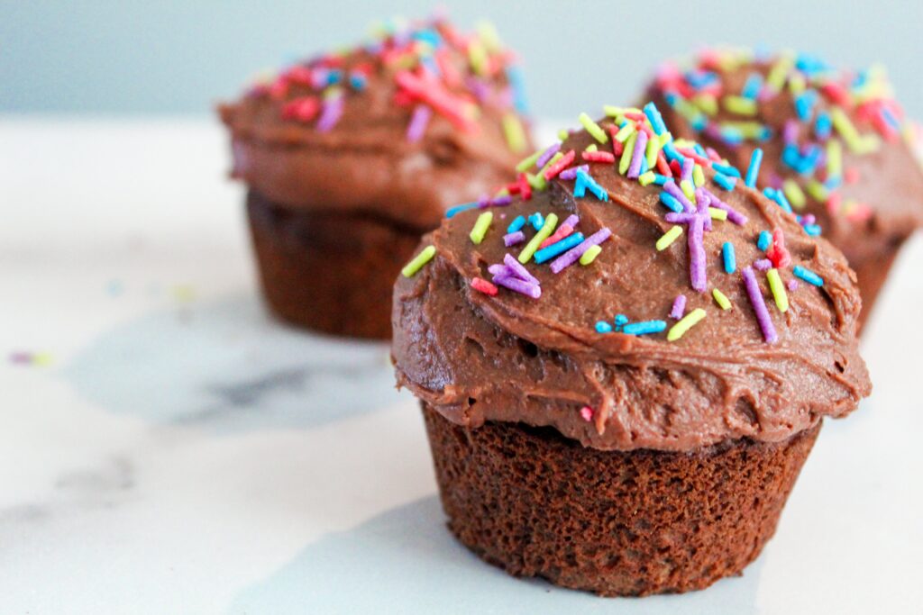 Moist and rich Homemade Keto Chocolate Cupcakes are, in the words of my daughter, "Almost like a real cupcakes!" {inserts crying laughing emoji here} They're gluten, grain, and (can be) dairy free, as well as low carb, ketogenic, and a THM:S.  I've included simple substitutes to make they paleo.