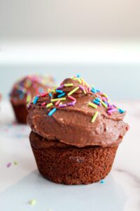 Moist and rich Homemade Keto Chocolate Cupcakes are, in the words of my daughter, "Almost like a real cupcakes!" {inserts crying laughing emoji here} They're gluten, grain, and (can be) dairy free, as well as low carb, ketogenic, and a THM:S.  I've included simple substitutes to make they paleo.