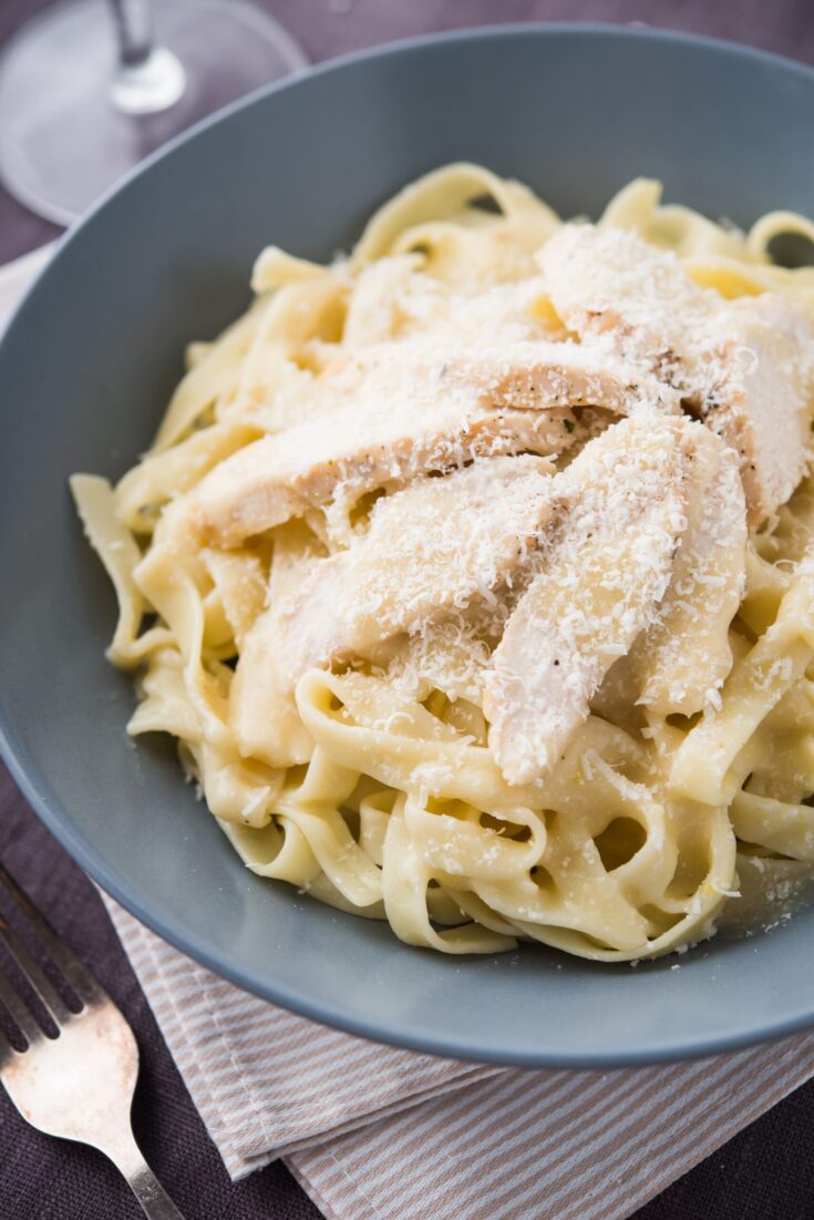 Creamy homemade Keto Alfredo Sauce made from garlic, parmesan, and cream.  The sauce is very easy to make low carb or Ketogenic - and tastes so much better than pre-made from the store.