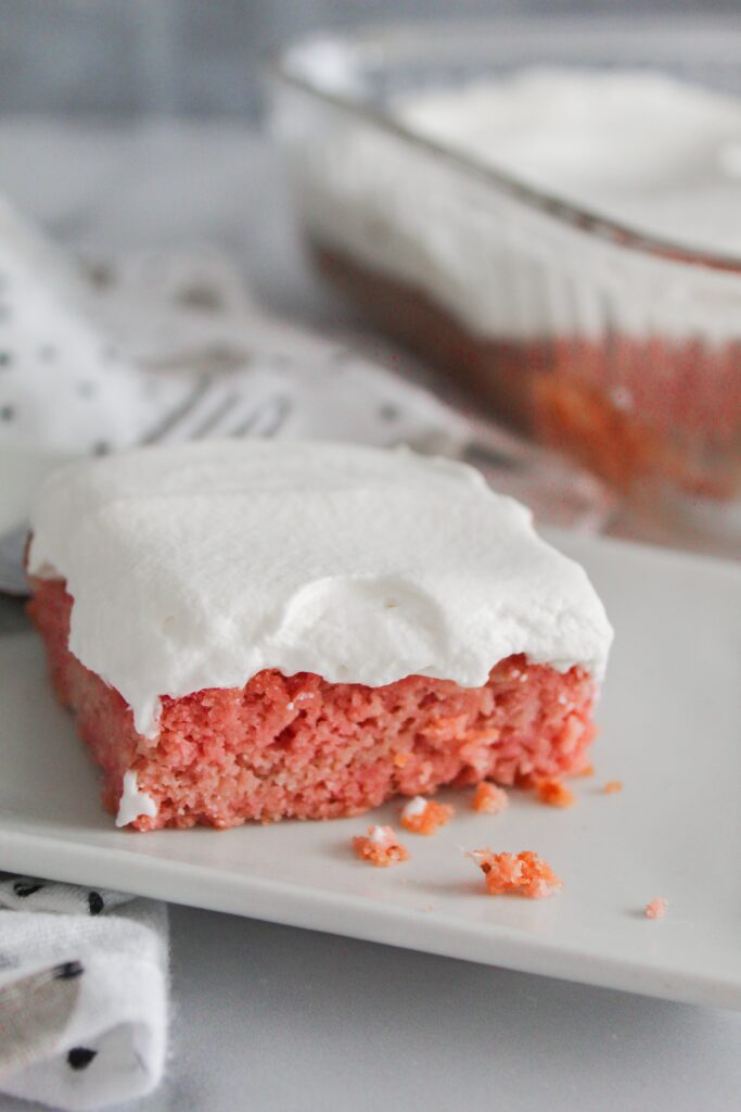 A rich keto strawberry cake with real strawberries baked in!  Top it with even more strawberries, whipped topping (there's a paleo version for you folks) or enjoy it by itself, keto strawberry cake is a delicious way to use up strawberries that have gone soft.