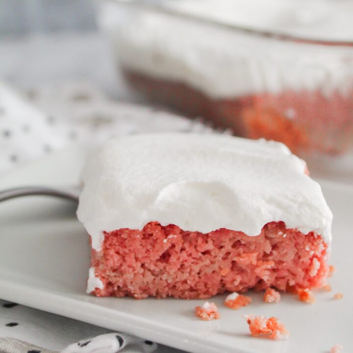 A rich keto strawberry cake with real strawberries baked in!  Top it with even more strawberries, whipped topping (there's a paleo version for you folks) or enjoy it by itself, keto strawberry cake is a delicious way to use up strawberries that have gone soft.