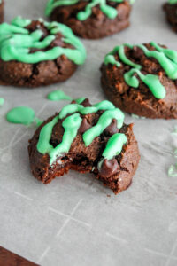 Like eating mint chocolate chip ice cream in cookie form, these Keto Mint Chocolate Chip Cookies in a warm, fresh-from-the-oven cookie! They're soft chocolate cookies, with sugar free mint chocolate chips, and drizzled with mint colored icing!  Delicious and healthy!