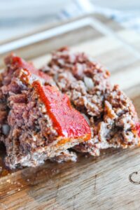 In cooler weather we all crave comfort foods, and for our family this Keto Meatloaf Recipe comes in handy when we want warm, hearty foods.  Top it with paleo ketchup or my own recipe {which I've shared} for a delicious, ketogenic dinner.