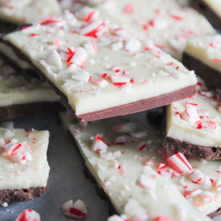 Low Carb Peppermint Bark is so easy!  Simple layer of keto white peppermint white chocolate, milk chocolate, and sugar free candy canes make for one of the easiest - and tastiest - low carb, ketogenic, holiday desserts!