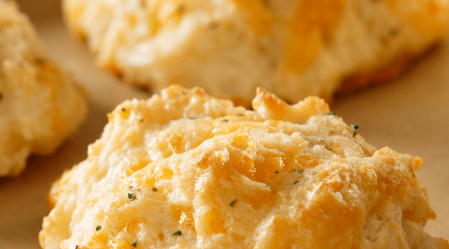 Super easy Keto Cheddar Biscuits that are fluffy and a copycat recipe to a popular restaurant chain. Garlicy, butter, and delicious, these biscuits are the perfect simple side.