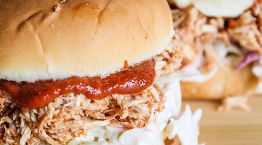 When warm weather comes around, I start putting easy, refreshing meals in the rotation, including hese Low Carb Pulled BBQ Chicken Sandwiches.  Pulled chicken with keto barbecue sauce, and keto coleslaw on a low carb bun - these are easy to put together and great during hot weather.