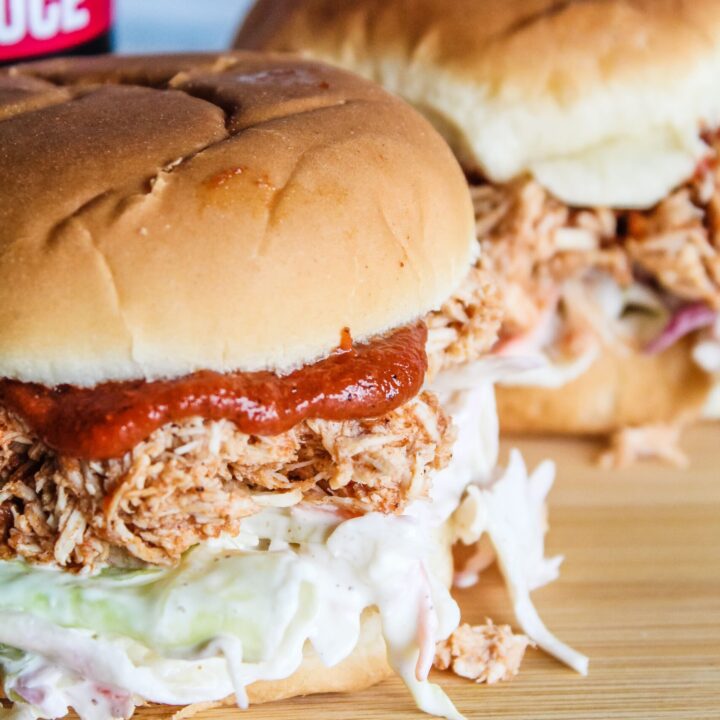 When warm weather comes around, I start putting easy, refreshing meals in the rotation, including hese Low Carb Pulled BBQ Chicken Sandwiches.  Pulled chicken with keto barbecue sauce, and keto coleslaw on a low carb bun - these are easy to put together and great during hot weather.