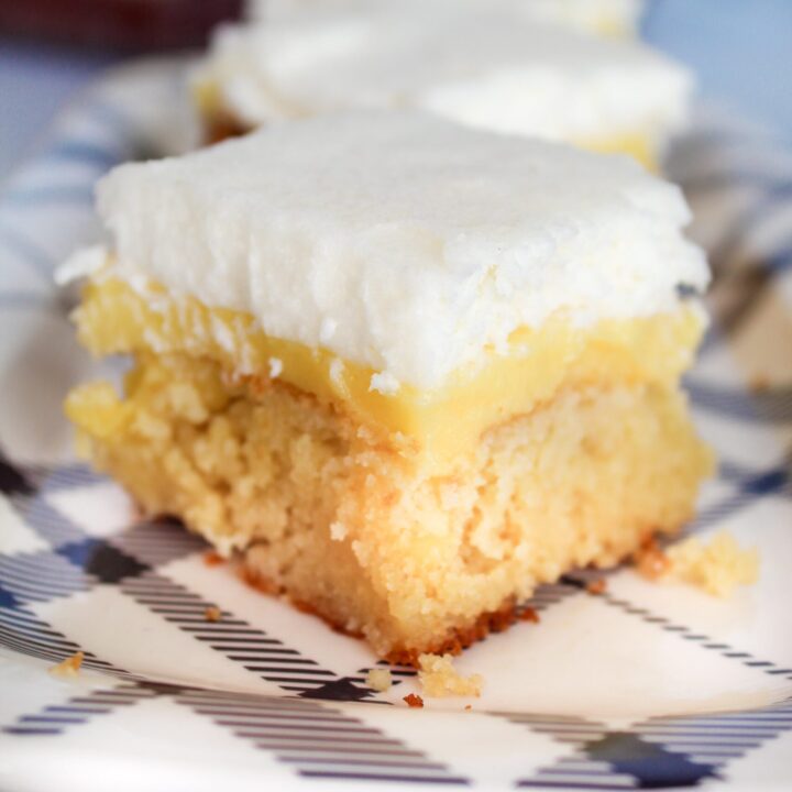 Keto Lemon Curd Cake is a delicious summer treat. Keto Lemon Cake is poked then covered with Keto Lemon Curd, then with lightly sweetened whipped cream.  This dessert is very simple and incredibly delicious!