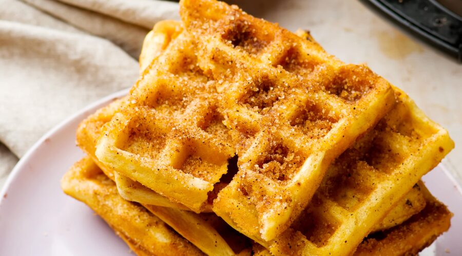 Keto Pumpkin Waffles are the more moist cousin of regular old keto waffles, made especially for fall! They take only 1 bowl to make, and freeze well so you can make them in bulk and have on hand to throw in the toaster!