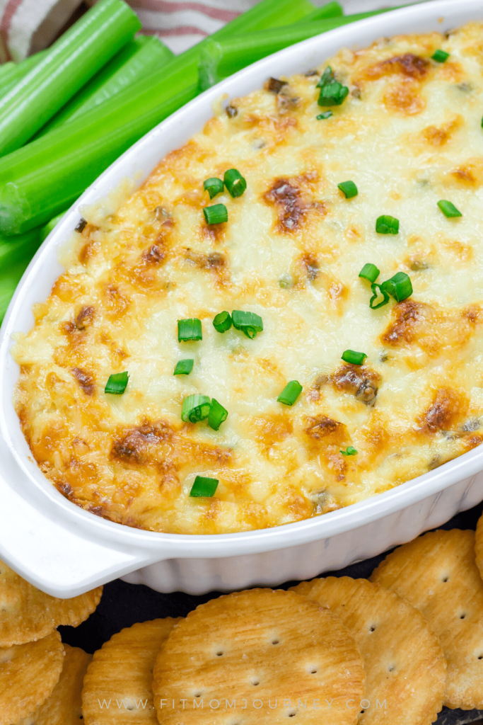 Sweet, creamy, and rich Keto Crab Rangoon Dip is a must-see appetizer for every party!  Crab meat mixed with cream cheese, mayo, and topped with mozzarella cheese is so flavorful you'll love dipping keto crackers in it.