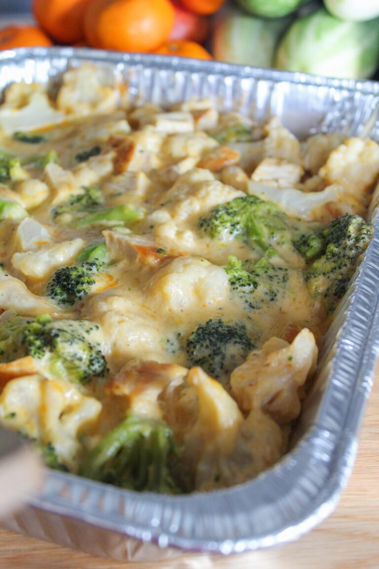 This Keto Chicken Broccoli Cheese Casserole includes a homemade cheese sauce, flavorful chicken, and delicious broccoli and cauliflower.  Kid-friendly and reheats well for lunches throughout the week or as leftovers.