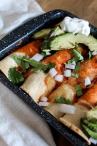 Love your dinner with easy to make Keto Chicken Enchilada Bake! Inspired by some of the amazing enchiladas I've had a Mexican restaurants throughout the years, these are cheaper and easier - for the whole family!
