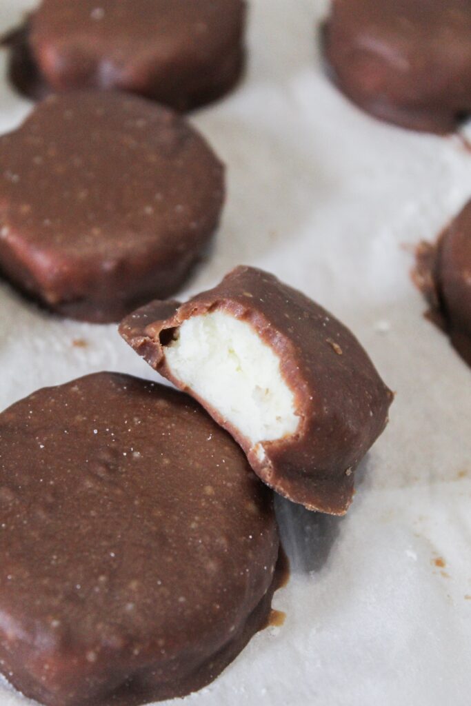 These Easy Low Carb Peppermint Patties are a copycat of York Peppermint Patties but made keto, low carb, and a THM:S. They use simple ingredients like dark chocolate, peppermint extract, heavy cream and cream cheese to make a dessert that doubles as a fat bomb for your sweet tooth.