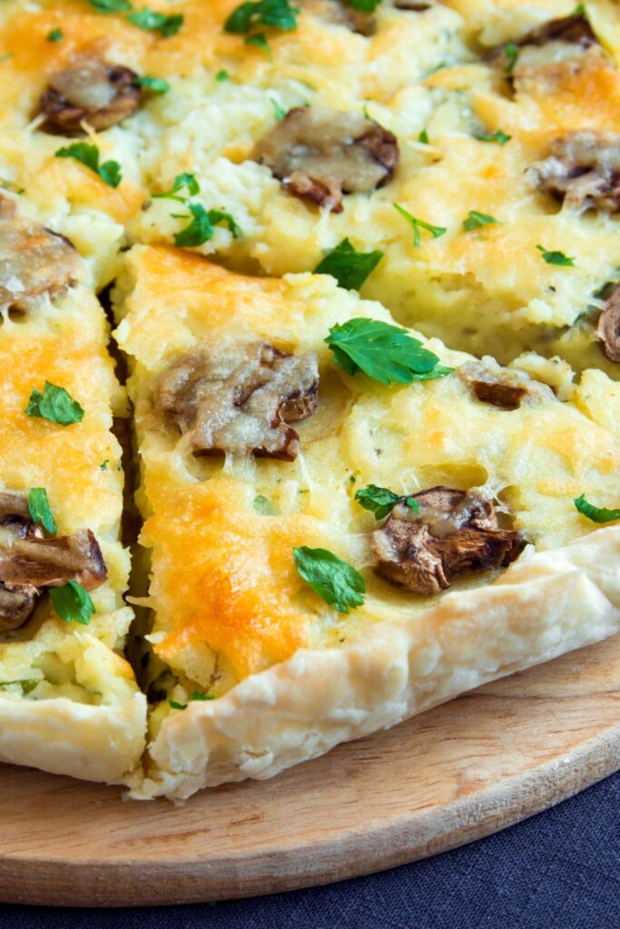 Perfectly light eggs, fresh mushrooms, smoked gouda, and bright spinach are all baked in a buttery low carb crust to make up this delicious Keto Mushroom Spinach Quiche. This quiche can be left crustless, or with a crust, and is the perfect make-ahead weekend or holiday meal. As a bonus, it is high protein, low carb, ketogenic, and gluten free!