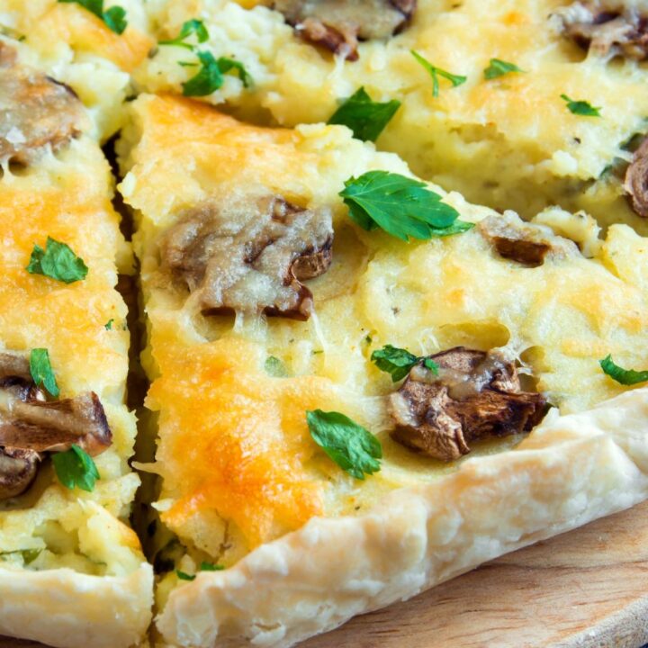 Perfectly light eggs, fresh mushrooms, smoked gouda, and bright spinach are all baked in a buttery low carb crust to make up this delicious Keto Mushroom Spinach Quiche. This quiche can be left crustless, or with a crust, and is the perfect make-ahead weekend or holiday meal. As a bonus, it is high protein, low carb, ketogenic, and gluten free!