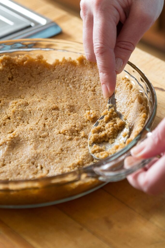 A press-in keto pie crust that requires just 3 simple ingredients and comes together in 5 minutes. Can be used for sweet pies or tarts, or in savory pies like quiche and tomato pie.