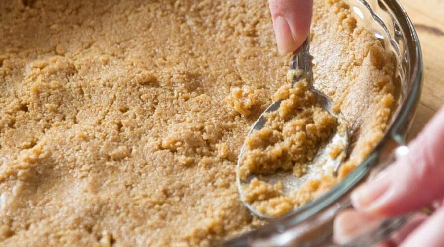 A press-in keto pie crust that requires just 3 simple ingredients and comes together in 5 minutes. Can be used for sweet pies or tarts, or in savory pies like quiche and tomato pie.