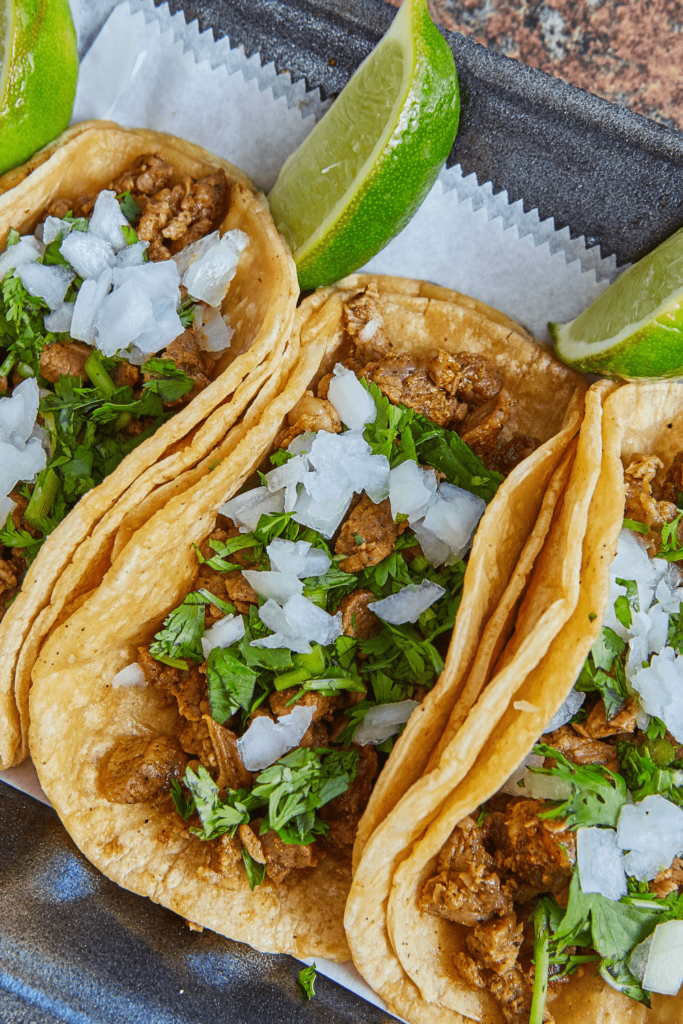Quick, easy & authentic Keto Steak Street Tacos you can make in 10 minutes at home! Topped with onion, cilantro and lime juice, they SO good as well as being low carb, ketogenic, and high protein.