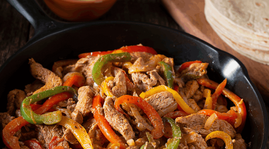 Learn how to make juicy restaurant-style chicken fajitas at home using a simple marinade, high heat, and the right searing technique. This recipe includes step-by-step instructions, ingredient tips, and pro secrets for perfectly charred peppers and tender chicken every time.